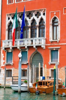 Boats docked in a canal, Venice, Italy