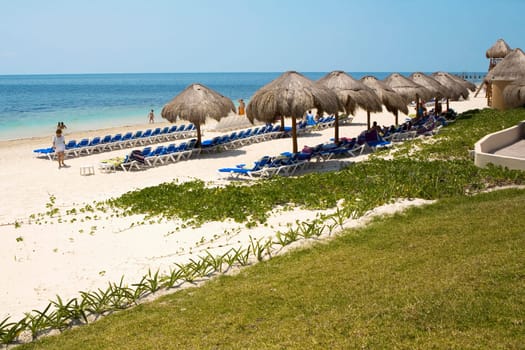 Tourists on the beach, Cancun, Mexico