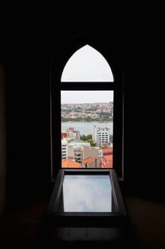 City viewed through an arched window of a building, Istanbul, Turkey