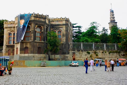 Tourists in front of a building, Walls of Constantinople, Istanbul, Turkey