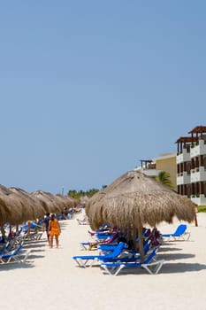 Tourists on the beach, Cancun, Mexico