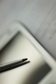 Close_up of a personal data assistant with a digitized pen