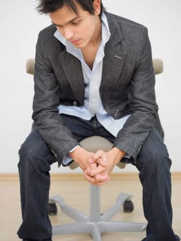 Close_up of a young man looking sad