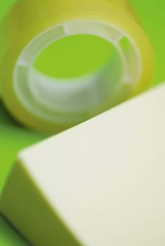 Close_up of an adhesive note with an adhesive tape