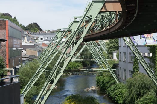 WUPPERTAL  NRW  GERMANY - JULY 31  2017:..The supporting framework of the Wuppertaler suspension railway consists of a steel framework with inclined supports and suspended steel bridges so-called Rieppelträger.