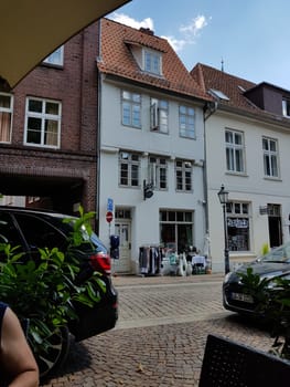LÜNEBURG, NIEDERSACHSEN, GERMANY - JULI 27, 2018:..Small boutique in Lüneburg old town