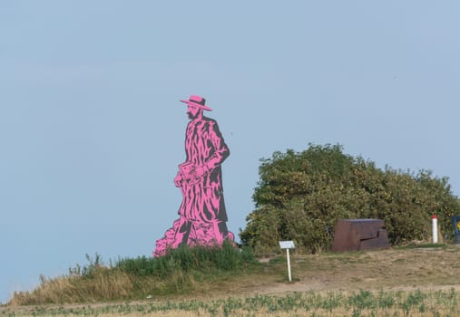 AHRENSHOOP ON THE DARS - JULY 30, 2018:..Paul Mueller-Kaempff Statue near Ahrenshoop in Germany.