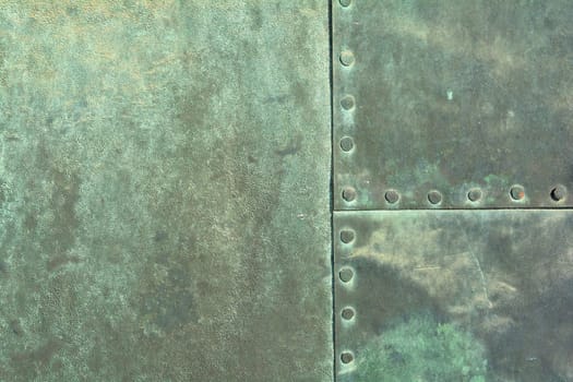 Copper sheet of an old historic door at Magdeburg Cathedral