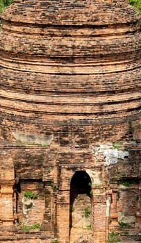 Brick wall of a Buddhist temple photographed close-up
