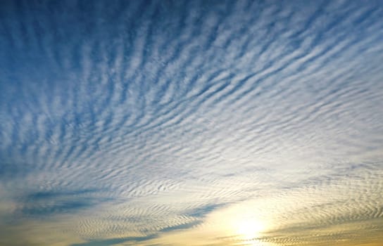 Beautiful sunset on a background of blue sky photographed close-up