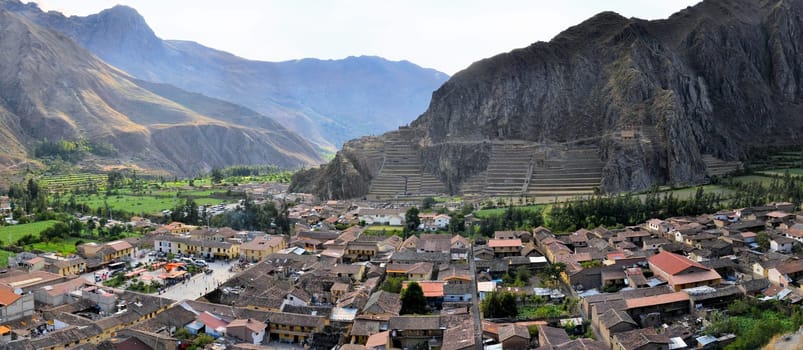 Ollantaytambo is an old Inca fortress and town the hills of the Sacred Valley between Machu Picchu and Cuzco in the Andes mountains of Peru, South America