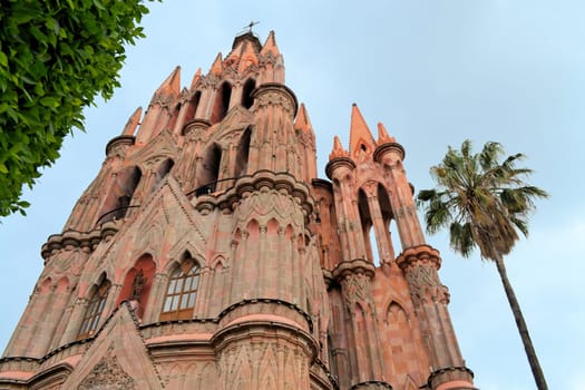 Parroquia Archangel is a gothic architecture pink painted church in San Miguel de Allende, Central Mexico