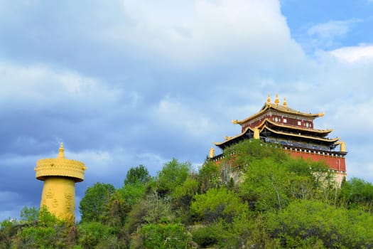 The biggest Buddhist prayer wheel in the world in Shangri-La - Zhongdian - China on the Tibetan plateau