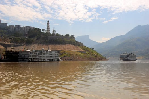 A view of the Yangtze river with cruise boats for tourists