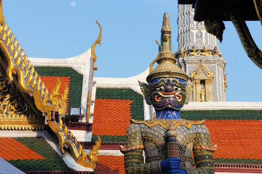 Guardian demon statue at Royal temple of the emerald Buddha, Bangkok, Thailand