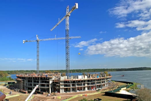 The construction of a building with 2 cranes