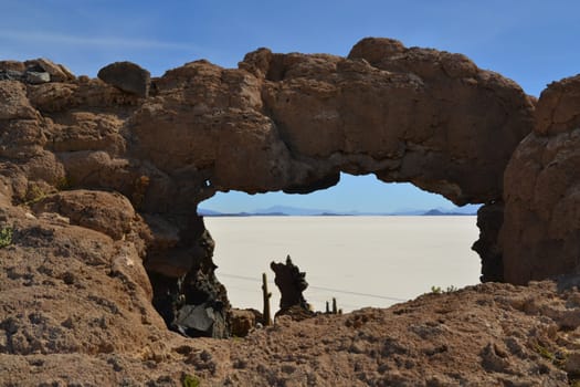 Rock Bridge on Isla del Pescador in Salar de Uyuni salt desert, Bolivia