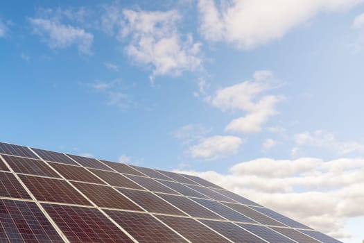 photovoltaic solar power panel on sky background, green clean Alternative power energy concept