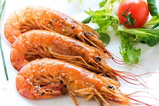 Extreme close up of mouthwatering fresh grilled king prawns.