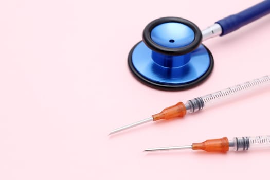 medicine diagnosis and prescription, syringe, stethoscope