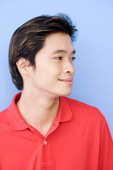 Close-up of a young man looking away