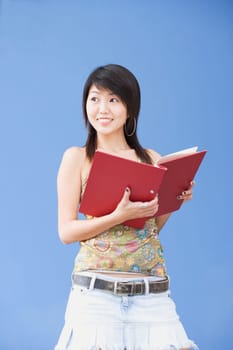 Young woman holding a file and smiling