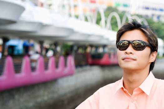 Close-up of a young man wearing sunglasses