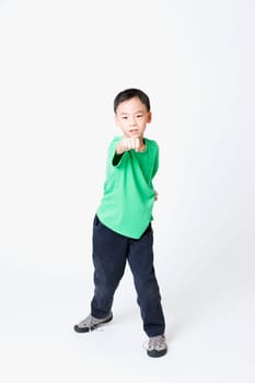 Portrait of a boy in a fighting stance