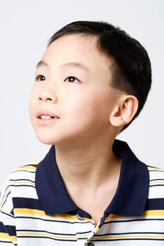 Close-up of a boy looking away