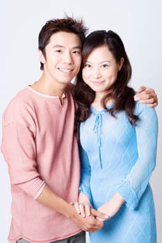 Portrait of a mid adult man and a young woman smiling