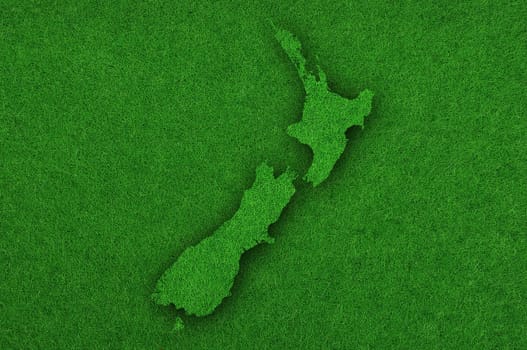 Map of New Zealand on green felt