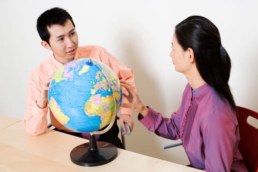Businesswoman discussing with a businessman