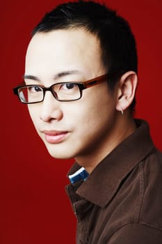 Portrait of a young man grinning
