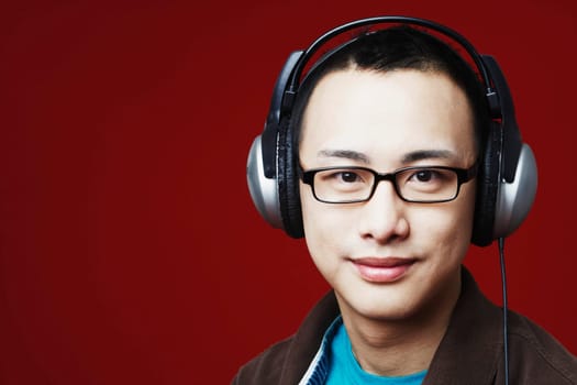 Portrait of a young man wearing headphones