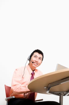 Businessman wearing headset and smiling