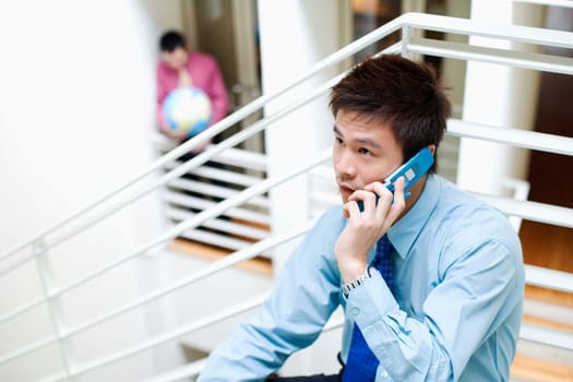 Close-up of a businessman talking on a mobile phone