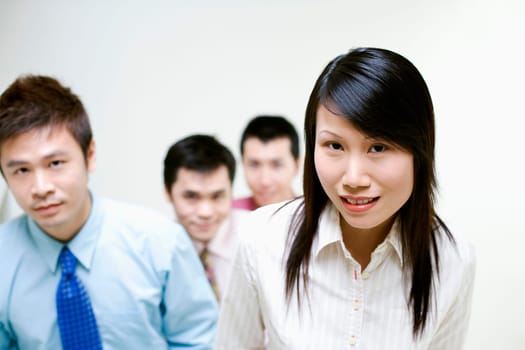 Portrait of business executives standing together