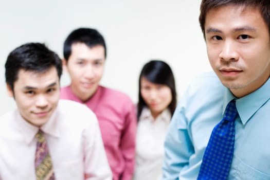 Portrait of business executives standing together