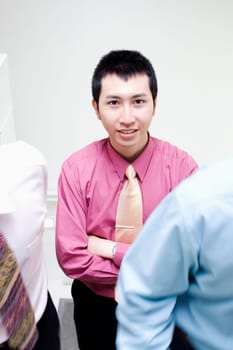 Portrait of a businessman smiling with his arms crossed