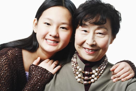 Portrait of a grandmother with her granddaughter