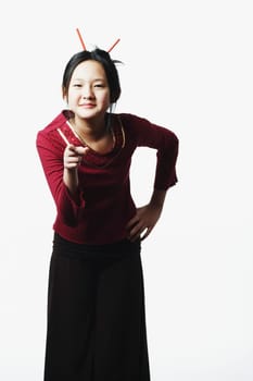 Portrait of a teenage girl pointing