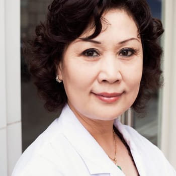 Close-up of a female doctor smiling