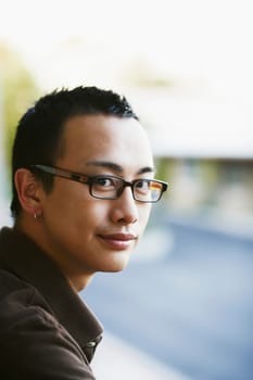 Portrait of a young man grinning