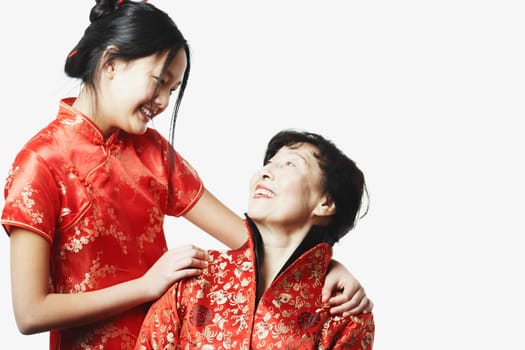 Close-up of a grandmother with her granddaughter