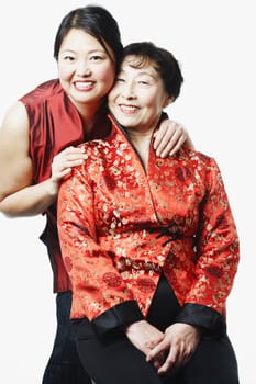 Portrait of a girl standing behind her mother