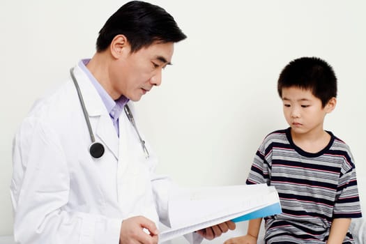 Close-up of a doctor looking at a medical report