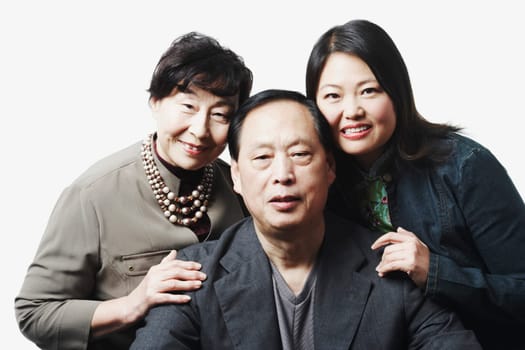 Portrait of parents with their daughter smiling