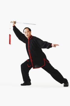 Portrait of a mature man holding a sword