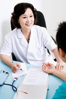 Close-up of a female doctor taking a patientŽs pulse
