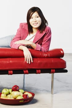 Young woman smiling and looking away